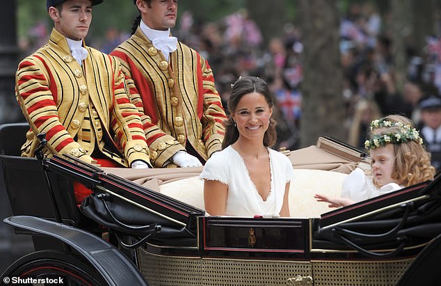 Maid-of-honour Pippa riding in a carriage during the wedding of Kate and William