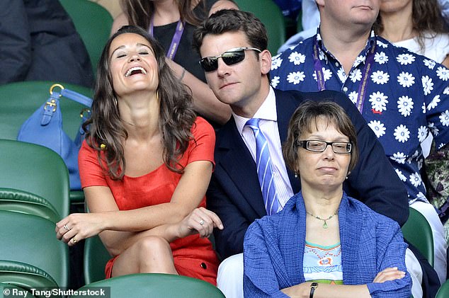 Pippa laughing as she sits next to Alex at Wimbledon in June 2011