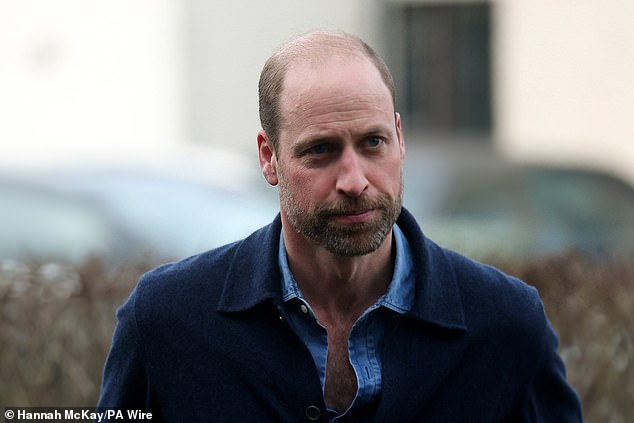 The heir to the throne donned a blue denim shirt, navy cardigan and navy chinos for the visit