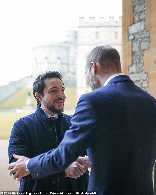 Crown Prince Hussein of Jordan is welcomed by Prince William at Windsor Castle today