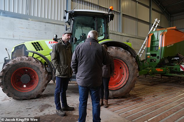 Pictured: The Prince of Wales being shown a seed drill during a visit to Lower Blakemere Farm, a Duchy Focus Farm in Hereford