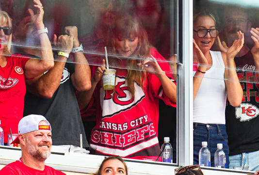 Recording artist Taylor Swift celebrates after a Kansas City Chiefs touchdown. Jay Biggerstaff-Imagn Images