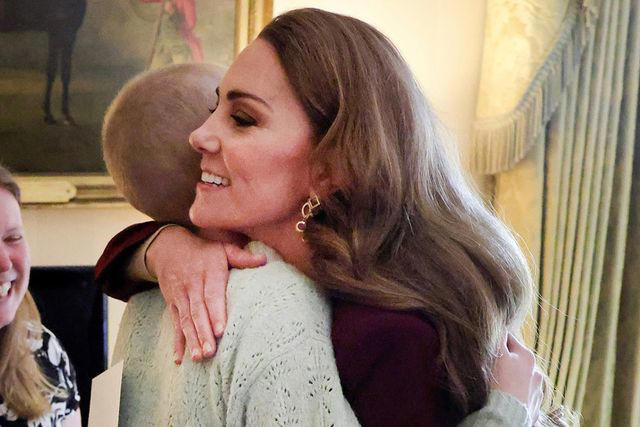 Andrew Parsons / Kensington Palace Kate Middleton hugging Liz Hatton at Windsor Castle on Oct. 2, 2024