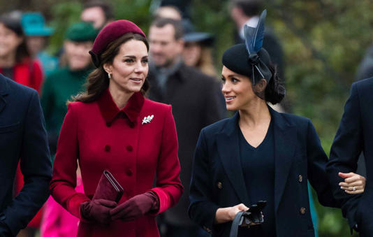 Getty Images Princess Kate and Duchess Meghan walking to the Christmas Day church service in 2018.