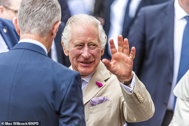 King Charles visiting Poundbury, Dorset. Opinions are more evenly divided on the monarch's return to work, with 40 per cent saying there is too much pressure on him to resume duties