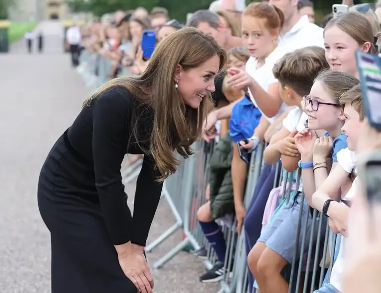 Kate Middleton meets members of the public on the Long Walk at Windsor Castle arrive to view flowers and tributes to Queen Elizabeth II | Chris Jackson/Getty Images