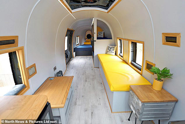 His 'café' helicopter is currently one of two that has been converted to luxurious glamping accommodation at a campsite near Scarborough, North Yorkshire 