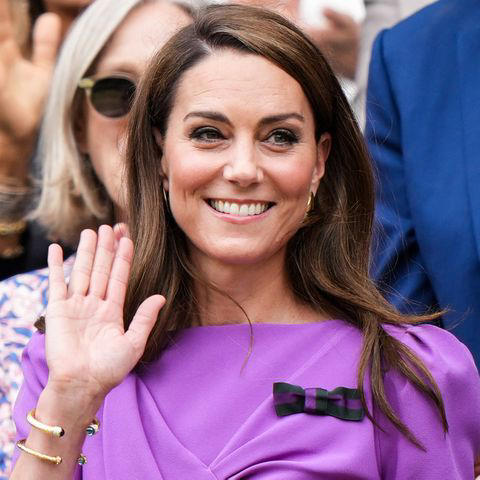 Shi Tang/Getty Catherine, Princess of Wales waves to fans during day fourteen of The Championships Wimbledon 2024 at All England Lawn Tennis and Croquet Club on July 14, 2024 in London, England