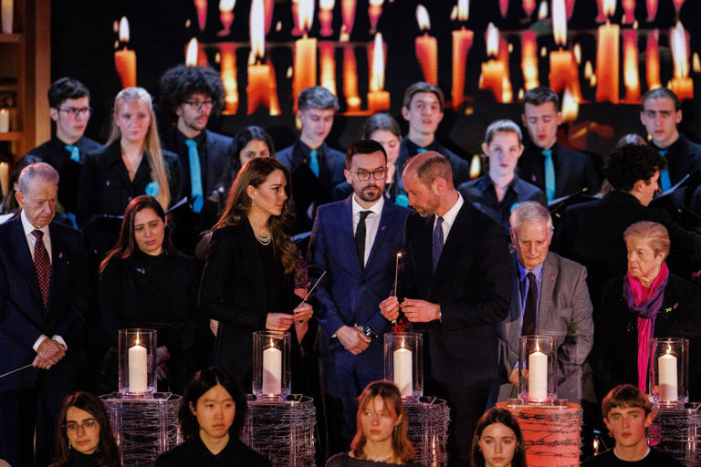 LONDON, ENGLAND - JANUARY 27: Catherine, Princess of Wales and Prince William, Prince of Wales light candles during a ceremony commemorating Holocaust Memorial Day on January 27, 2025 in London, England. Prime Minister Keir Starmer and Prince William were among the British officials and celebrities who marked Holocaust Memorial Day and the 80th anniversary of the liberation of Auschwitz-Birkenau during World War II. (Photo by Dan Kitwood/Getty Images)