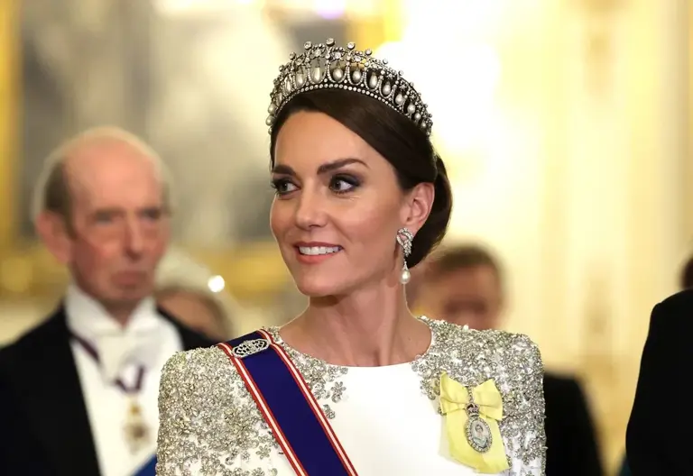 Kate Middleton wearing Queen Mary’s Lover’s Knot tiara during a banquet at Buckingham Palace | Chris Jackson/Getty Images