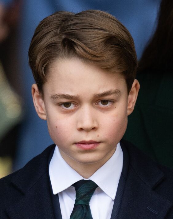 Prince George wearing a suit and a tie