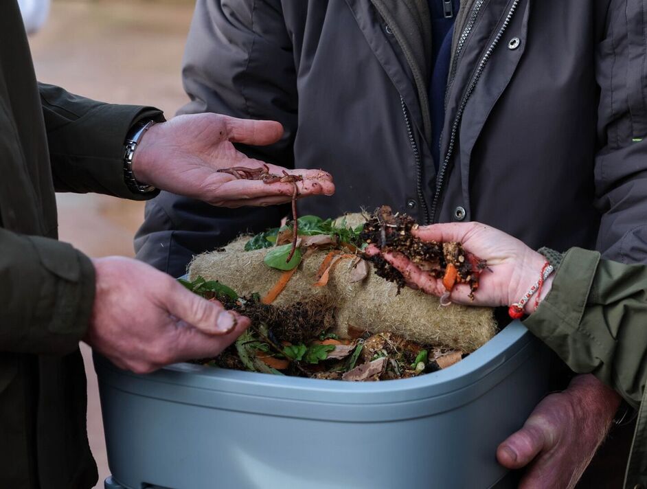 Prince William sees the farming family's composting projects