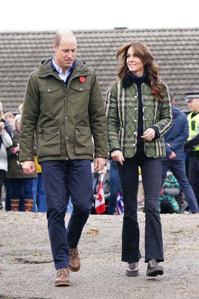 Kate beside william in jeans and checked coat