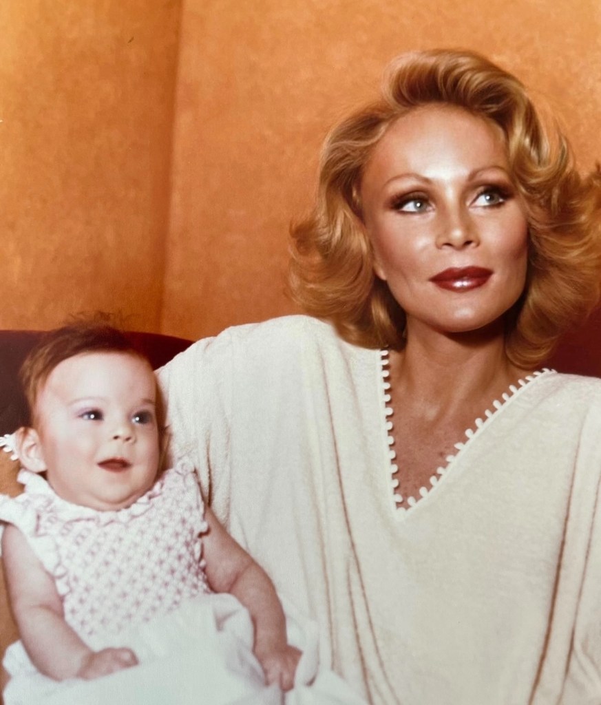 Jocelyn Wildenstein holds a baby Diane Wildenstein.