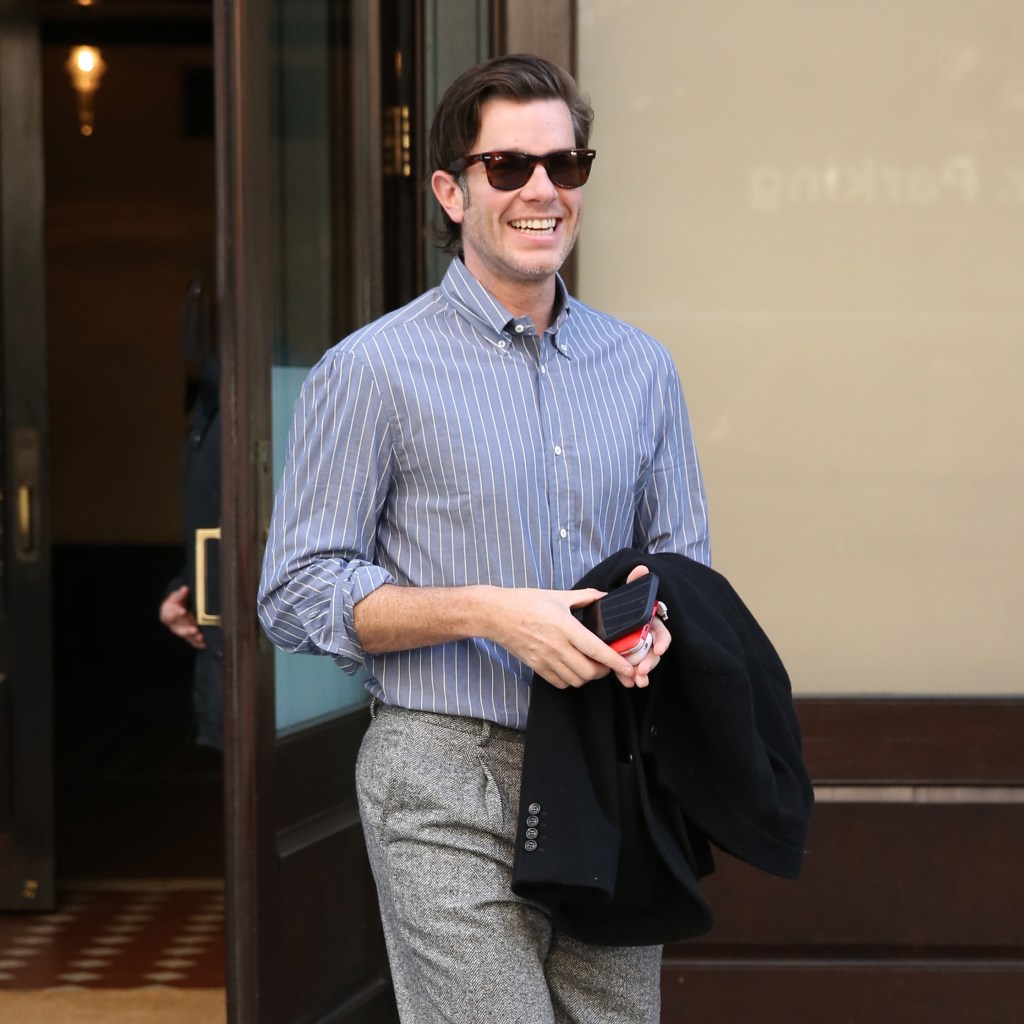 John Mulaney is all smiles as he leaves the Greenwich Hotel in New York City.