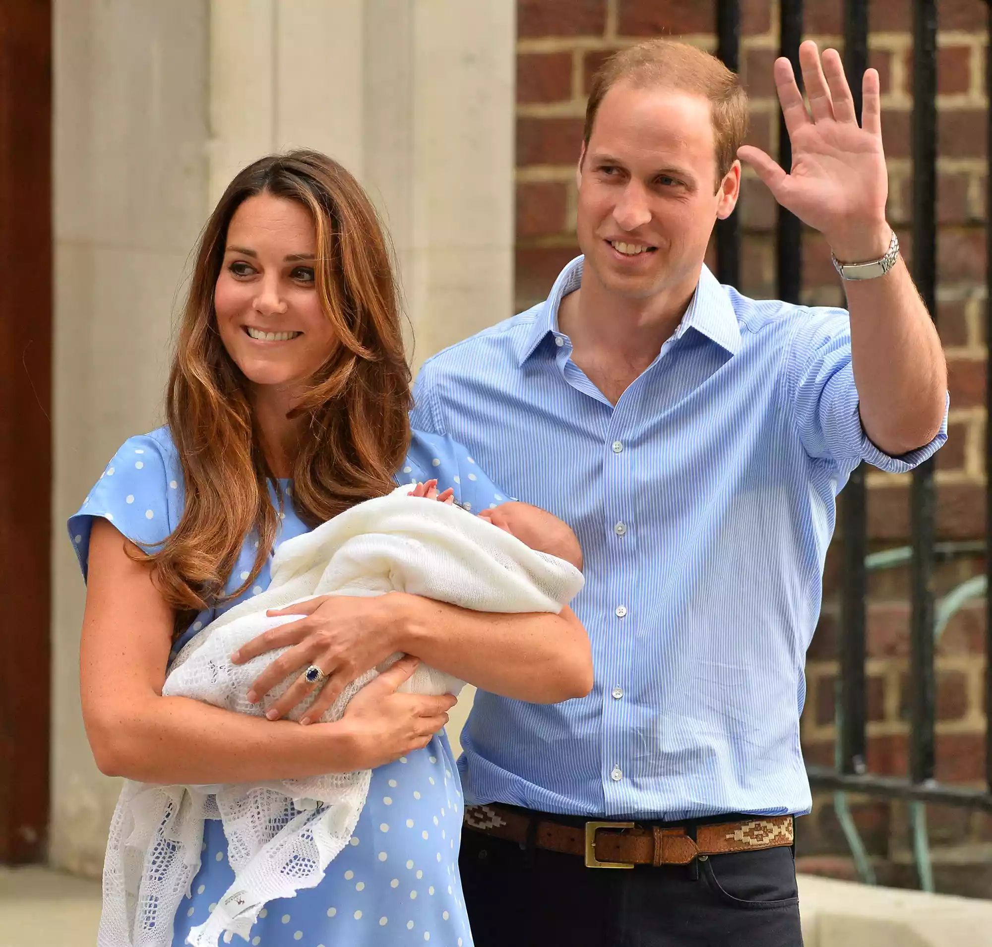 Prince William and Catherine, Duchess of Cambridge show their new-born baby boy to the world's media, standing on the steps outside the Lindo Wing of St Mary's Hospital in London on July 23, 2013