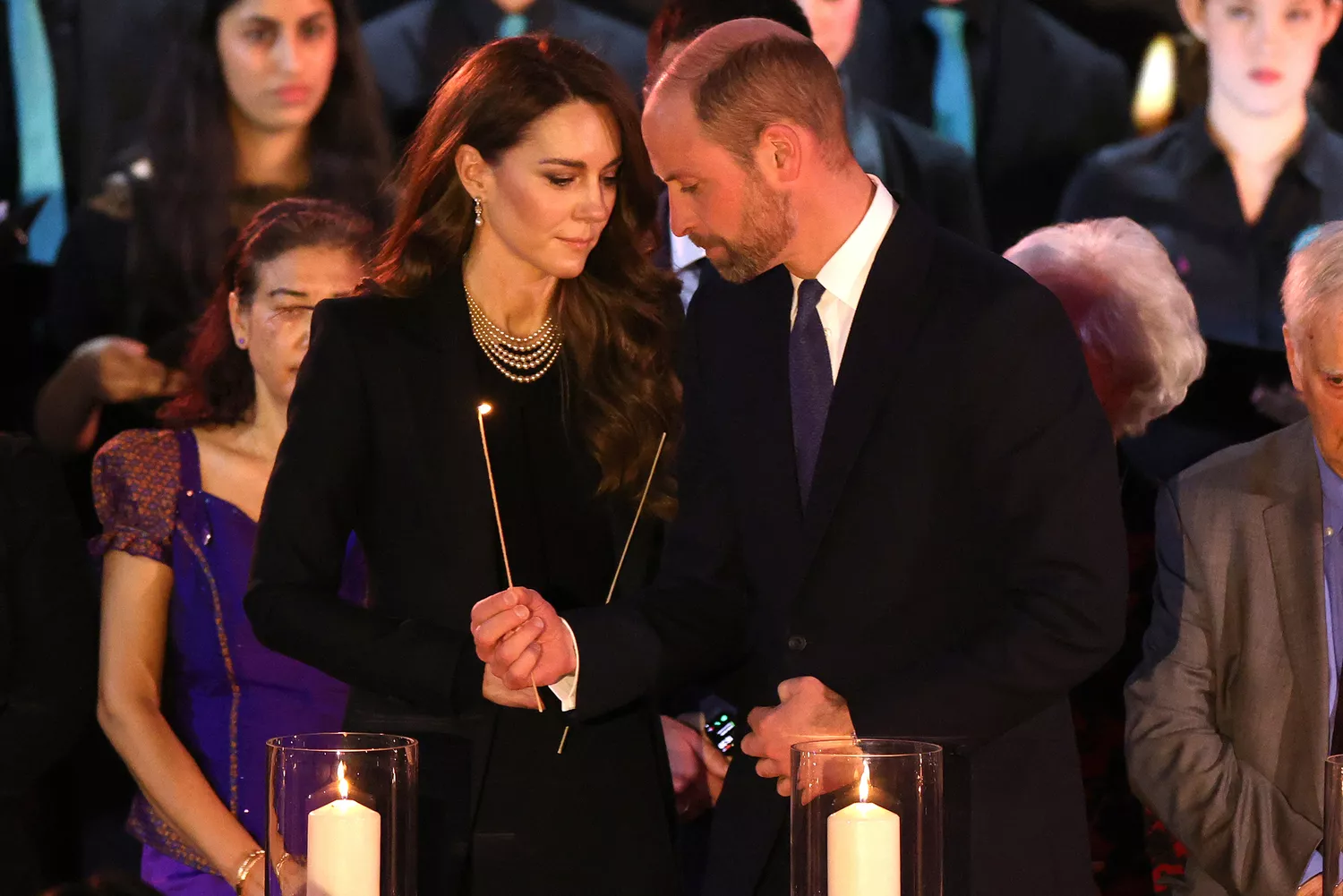 Catherine, Princess of Wales and Prince William, Prince of Wales light candles during a ceremony commemorating Holocaust Memorial Day on January 27, 2025 in London, England.