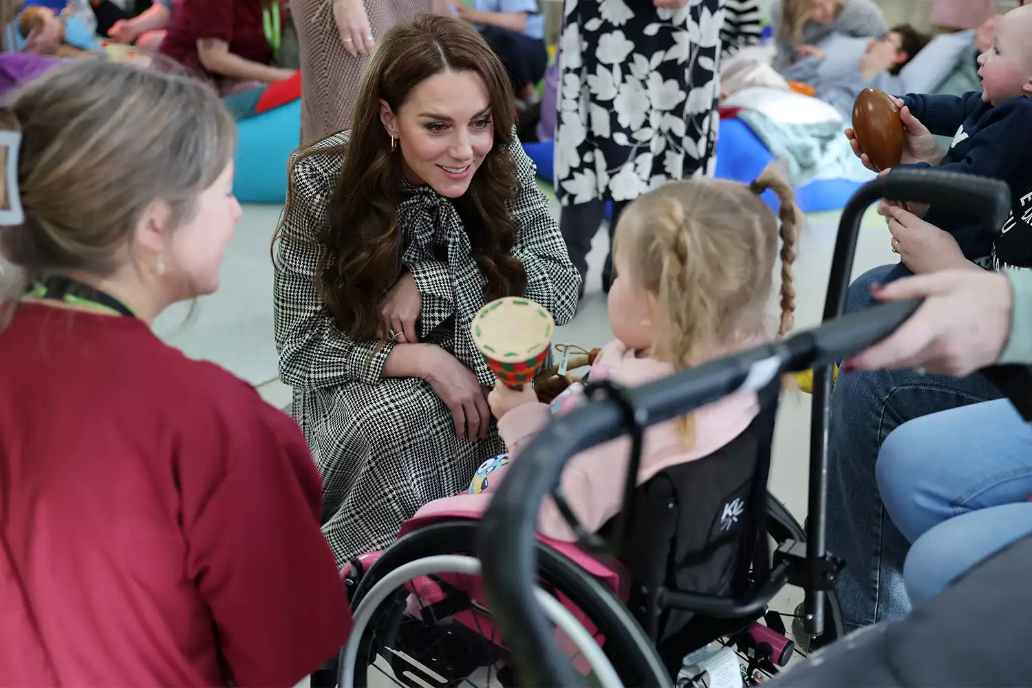 Catherine, Princess of Wales talks with 3 year old Dani-Rae during her visit to TA Hafan, a children's hospice based in Sully, near Cardiff, which supports families in Wales to ensure that children with life-shortening conditions live fulfilling lives, on January 30, 2025 in Sully, Wales. 