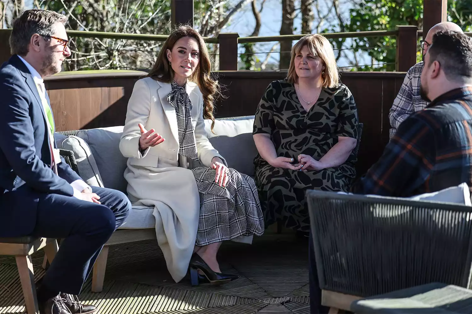 Catherine, Princess of Wales talks to bereaved family members as she visits TA Hafan, a children's hospice based in Sully, near Cardiff, which supports families in Wales to ensure that children with life-shortening conditions live fulfilling lives, on January 30, 2025 in Sully, Wales