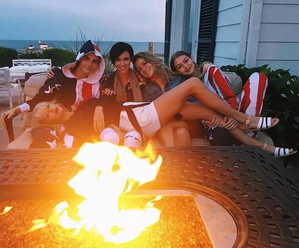 Taylor Swift at her Rhode Island home with Gigi Hadid, Cara Delevingne and others.