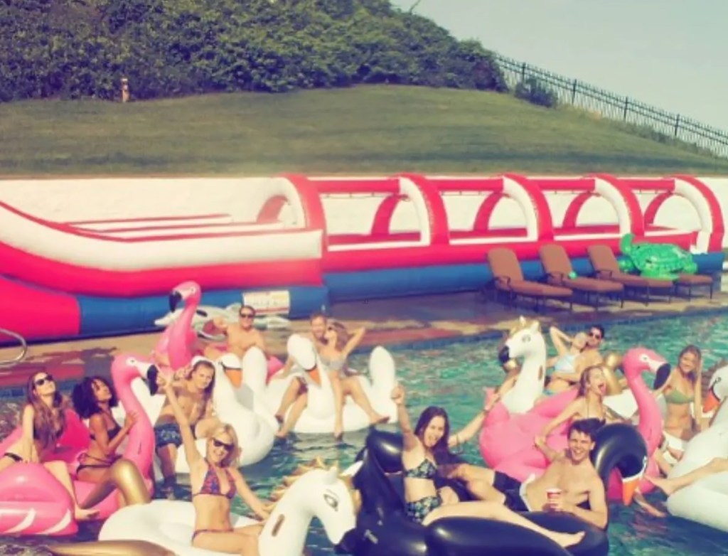 Taylor Swift at her Rhode Island home with friends in the pool.