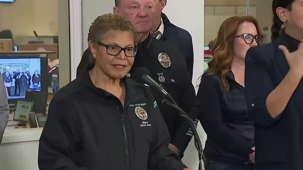 Karen Bass speaking at a press conference.