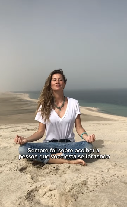 Gisele Bündchen doing a yoga pose.