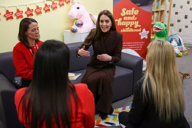 Kate chats during a visit to the prison's mother and baby unit