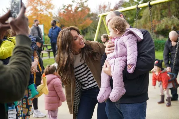 The Princess of Wales takes part in a Dad Walk in the local park during a visit to "Dadvengers"