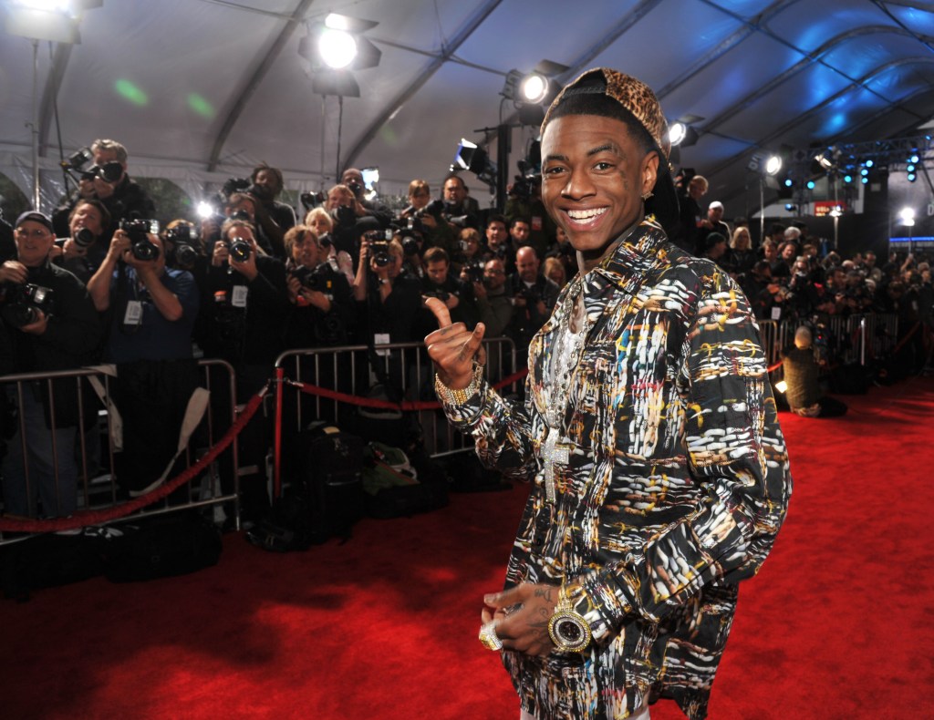 Rapper Soulja Boy arrives at the 2011 American Music Awards held at Nokia Theatre L.A. LIVE on November 20, 2011 in Los Angeles.