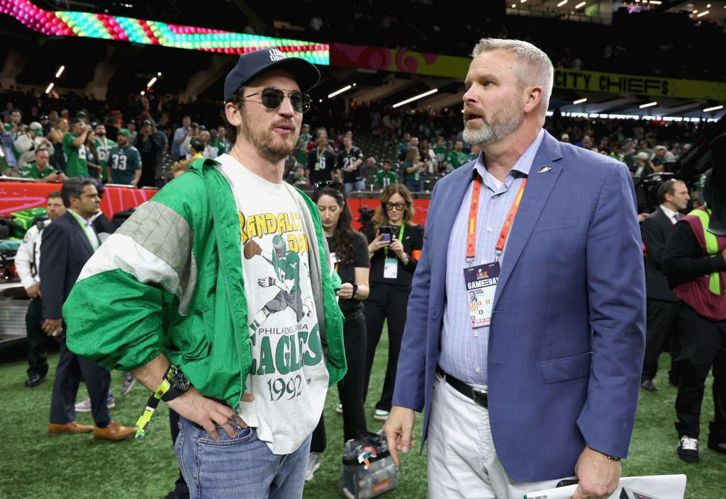 Miles Teller and Brian Papson attend Superbowl LIX