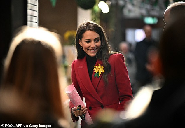 Kate beamed as she enjoyed Pontypridd Market in Wales - with her husband Prince William - this afternoon