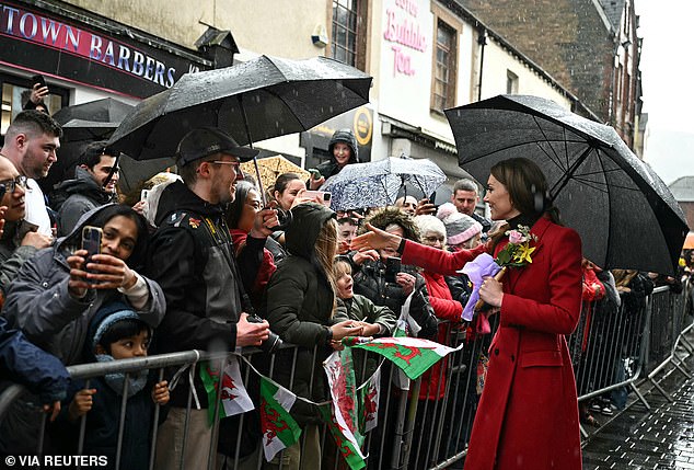 The pair braved both rainy and sunny weather this afternoon, as they stepped out and spoke with people