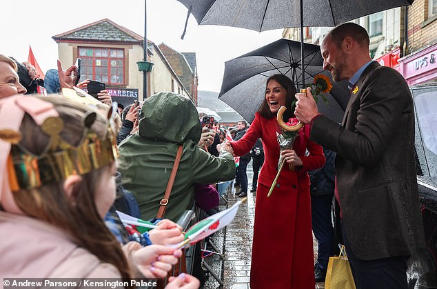 William and Kate braved all sorts of weather as they chatted with people during their joint engagement