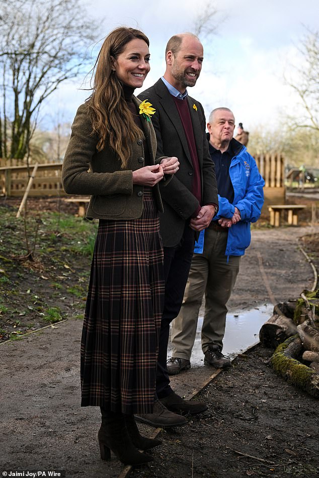 The couple smiled as they visited the garden which aims to create a safe and welcoming place where the local community can come together and enjoy the benefits of nature