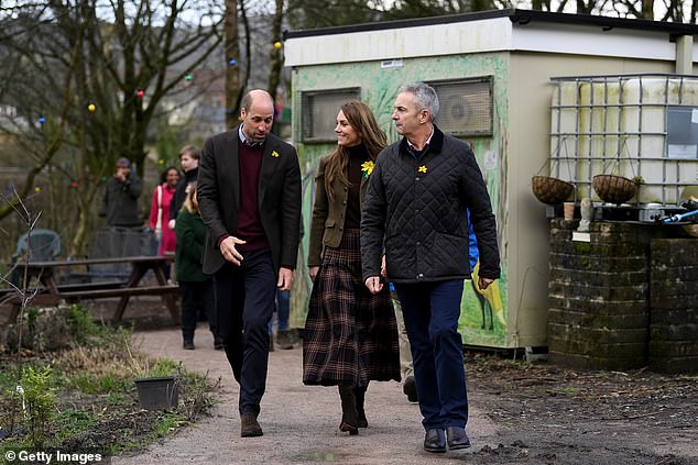 William and Kate looked to be in high spirits as they enjoyed their visit to the community garden today