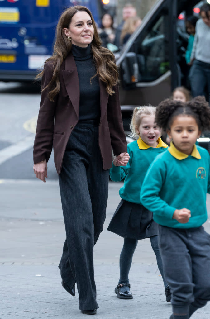 Kate Middleton, Princess of Wales visits The National Portrait Gallery on Feb. 4 in London, brown blazer, turtleneck, pinstripe pants