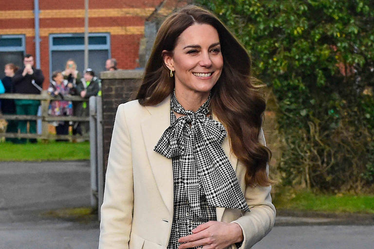 WPA Pool / Getty Images Catherine, Princess of Wales arrives for a visit to Corgi, a family run textiles manufacturer focused on the production of socks and knitwear on Jan. 30, 2025 in Ammanford, Wales