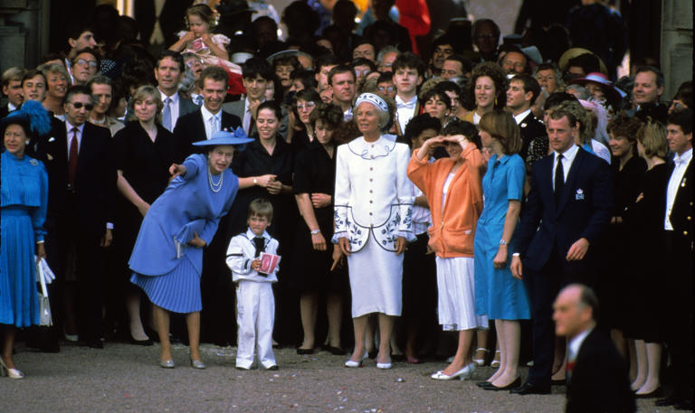 Queen Elizabeth ended up chasing Prince William as they stood with guests after Prince Andrew and Sarah Ferguson's wedding. (Image credit: Getty Images)