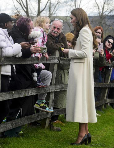 Rebecca Naden - WPA Pool/Getty Catherine, Princess of Wales (R) meets members of the public during a visit to Corgi, a family run textiles manufacturer focused on the production of socks and knitwear on Jan. 30, 2025 in Ammanford, Wales