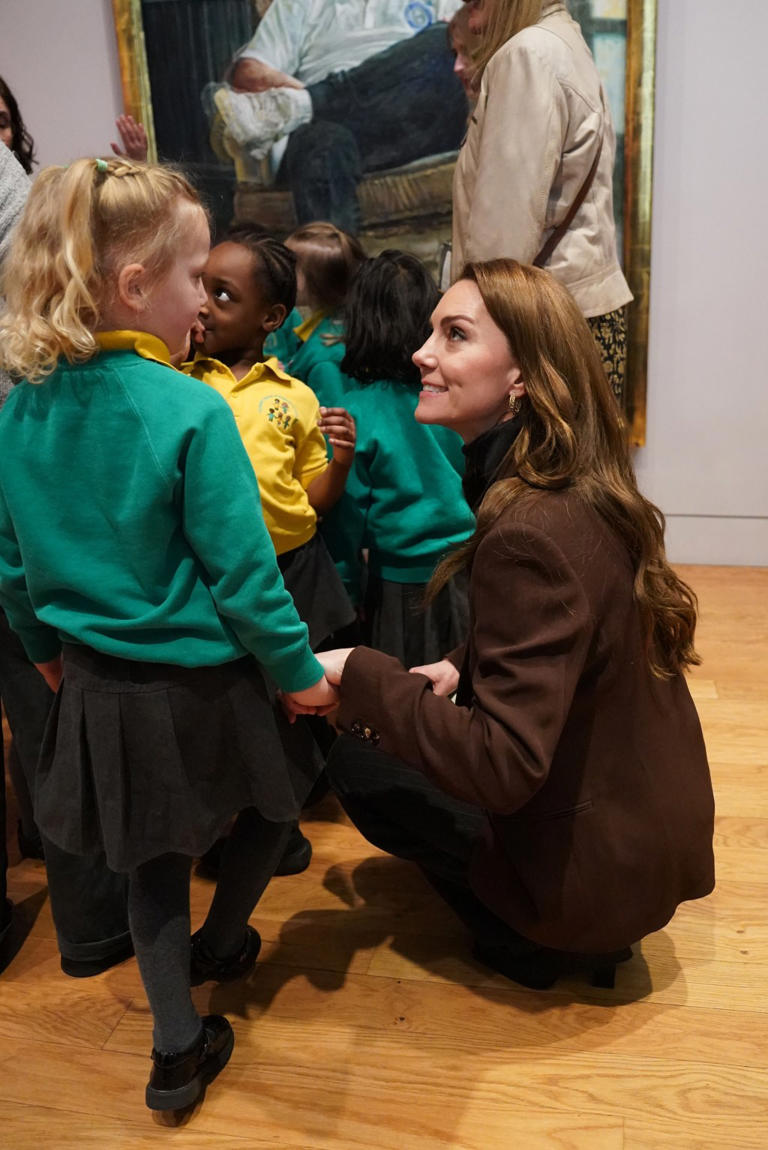 She wore a turtleneck beneath a blazer for the outing. Getty Images