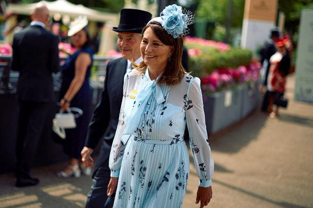 BENJAMIN CREMEL/AFP via Getty Michael and Carole Middleton at Royal Ascot on June 19, 2024.