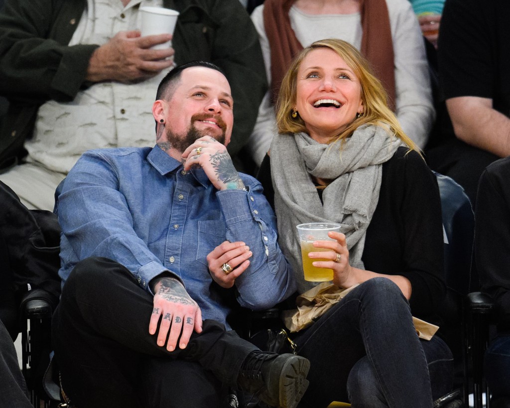 Cameron Diaz and Benji Madden at a game