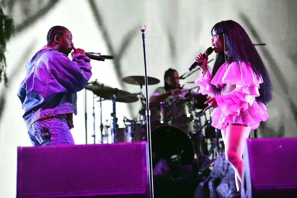 A photo of Kendrick Lamar and SZA