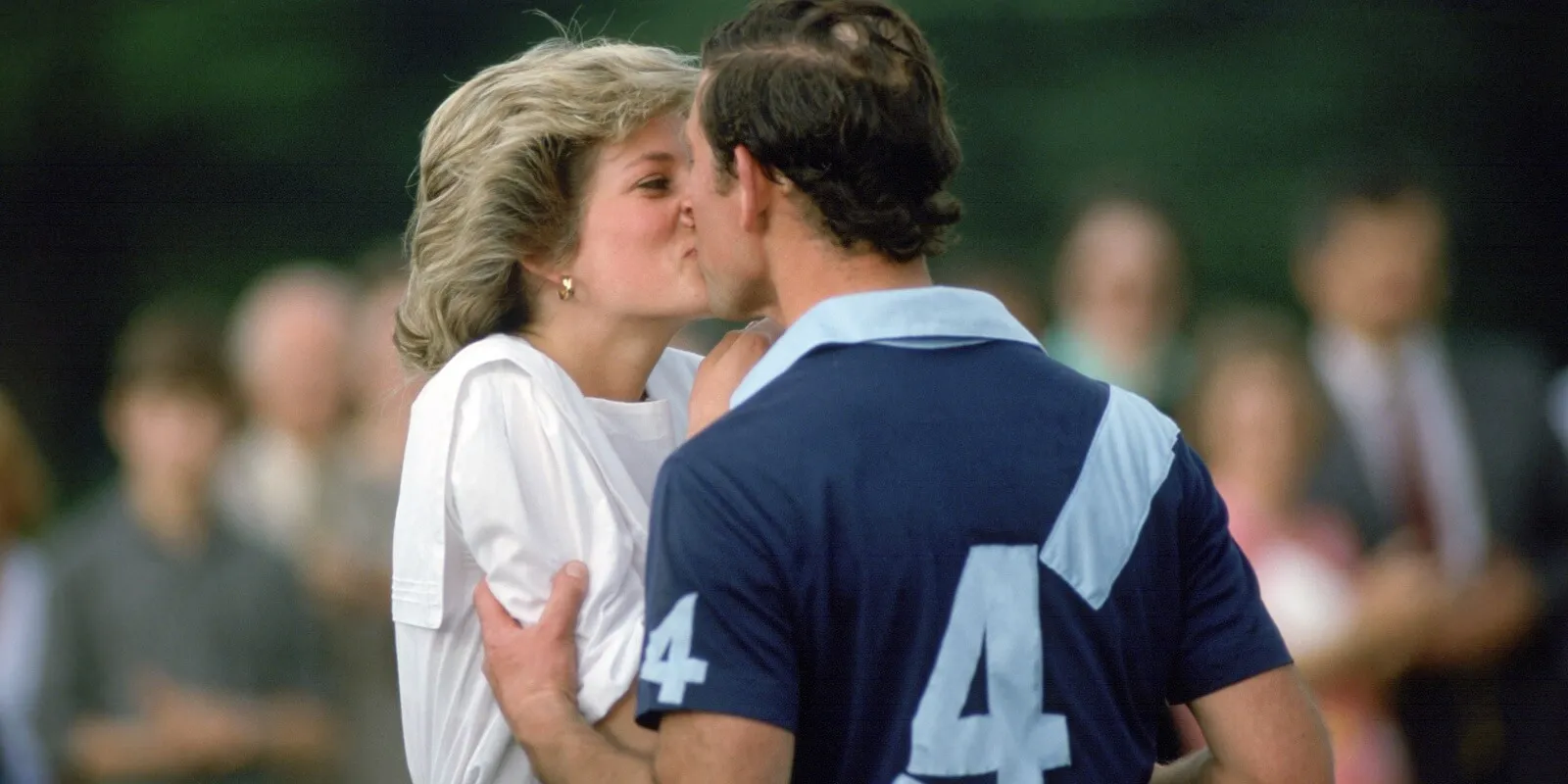 Princess Diana publicly kisses then-Prince Charles after a polo match