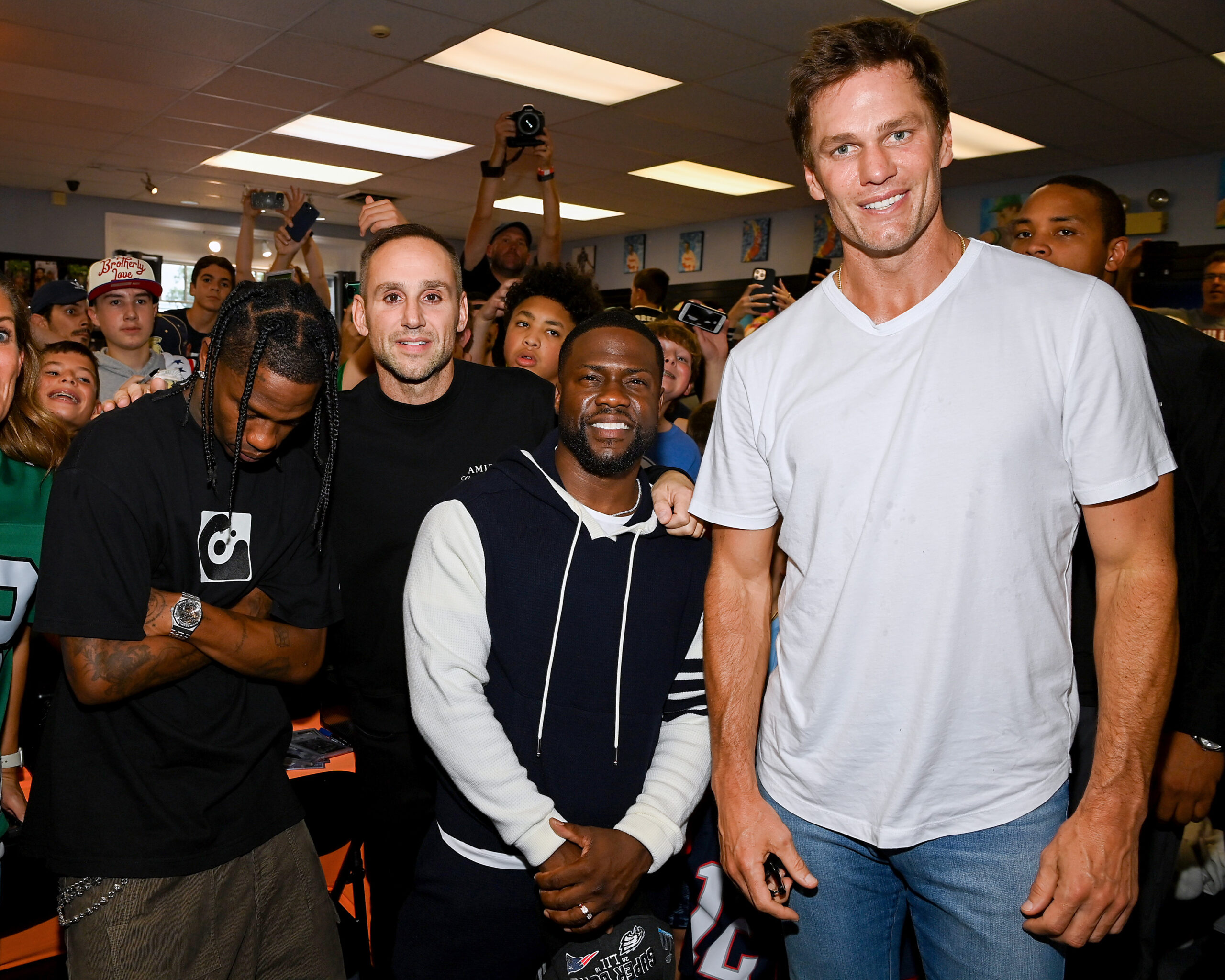 Michael Rubin, Tom Brady and Kevin Hart.