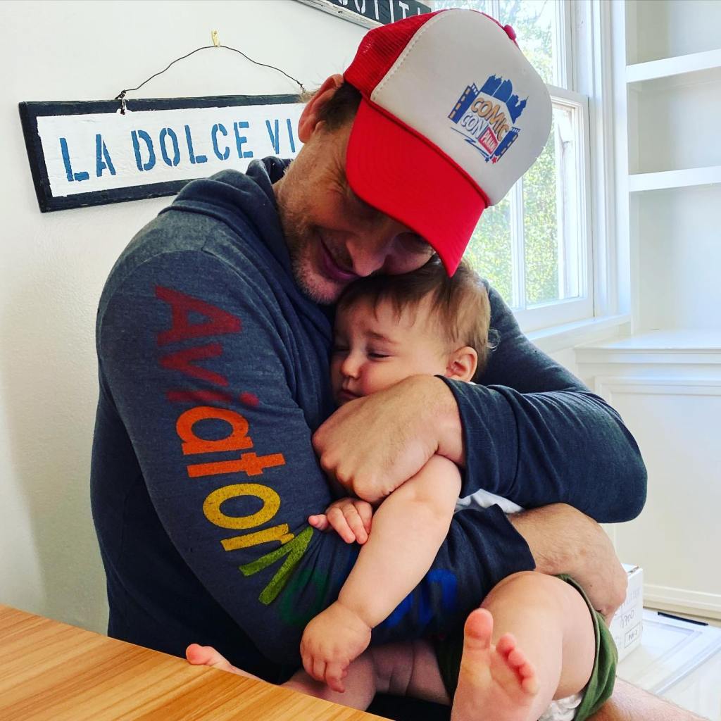 Peter Facinelli hugging his son Jack